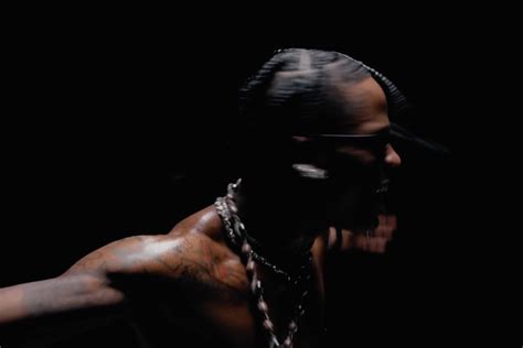 Travis Scott Releases New ‘Fe!n’ Video With Playboi Carti: Watch