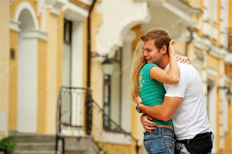 Embraced young couple — Stock Photo © jaroscha #49771773