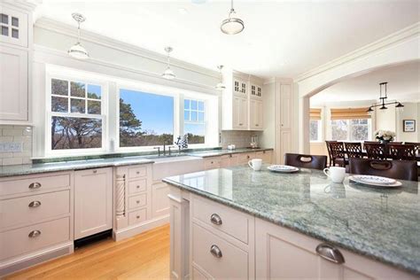 Traditional kitchen with white cabinets and tropical green granite counters #Girlsbedroomfurn ...