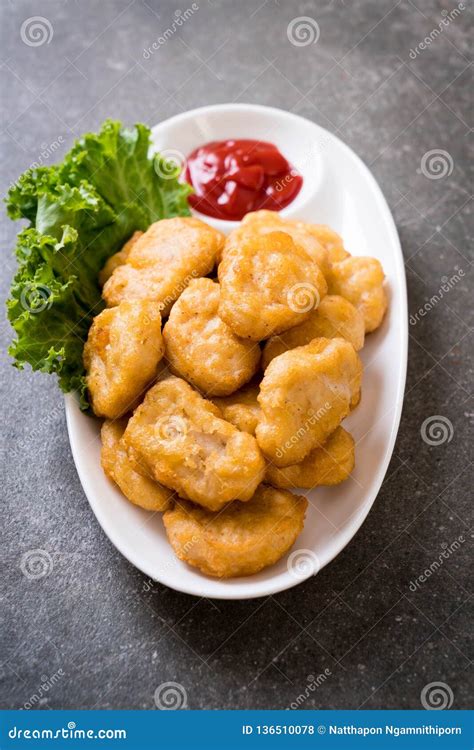 Chicken nuggets with sauce stock photo. Image of white - 136510078