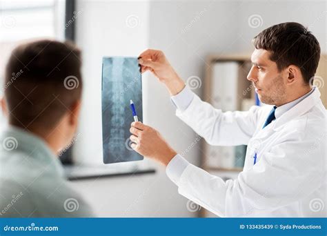 Doctor Showing X-ray To Patient at Hospital Stock Image - Image of professional, appointment ...