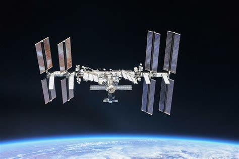 Astronauts take shelter as space station dodges orbital junk | Space