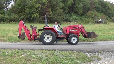 Massey ferguson gc1715 backhoe attachment