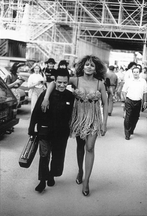 Tina Turner & Azzedine Alaia under the Eiffel Tower by Peter Lindbergh, 1989 © Peter Lindbergh ...