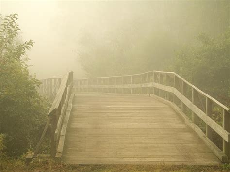 Misty Bridge Photograph by Andrew Kazmierski