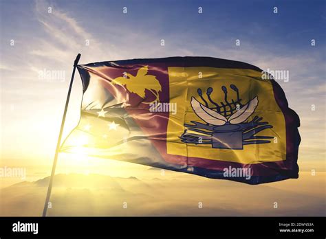 Western Fly province of Papua New Guinea flag waving on the top sunrise ...