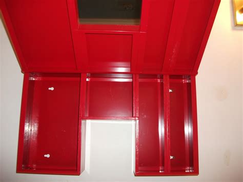 Moving out of Timmins sale: Red IKEA medicine Cabinet