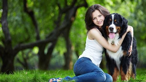 Wallpaper Happy girl and her dog, hug, grass 2560x1600 Picture, Image