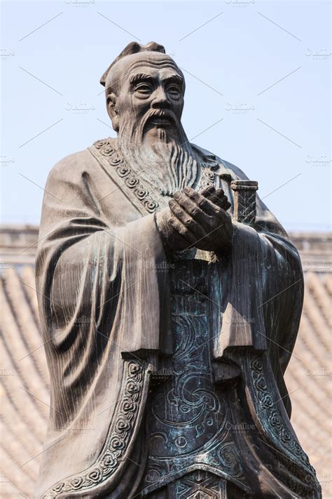 Bronze statue of Confucius in traditional pose | High-Quality ...