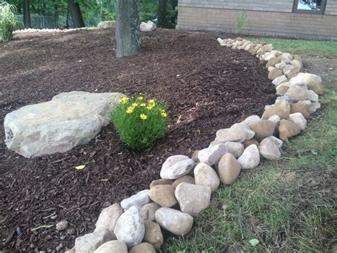 Large river rock makes an incredible border | Landscaping with rocks ...