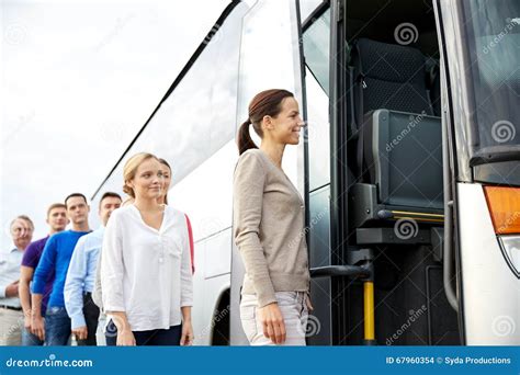 Group of Happy Passengers Boarding Travel Bus Stock Photo - Image of ride, inside: 67960354