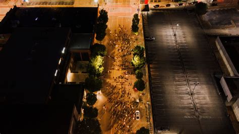 Crowd of people walking in city at night · Free Stock Photo