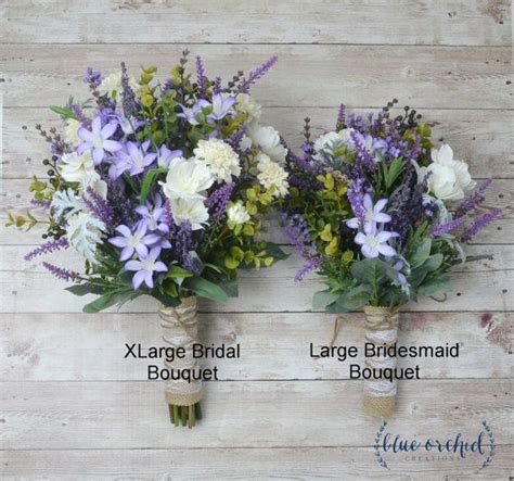 This wildflower bouquet is full of lavender, purple wildflowers, ivory ...