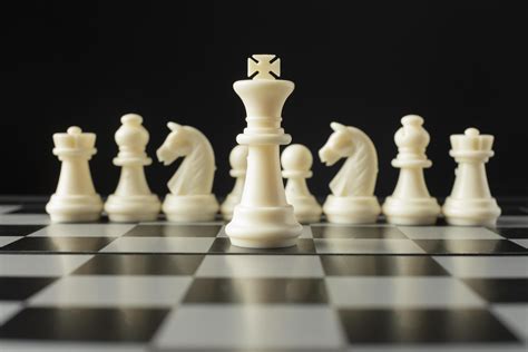 White chess pieces on chess board king concept 2413375 Stock Photo at ...