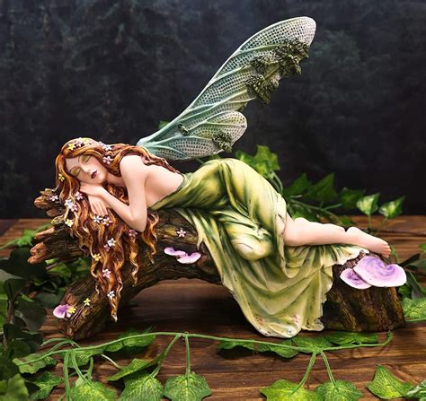 Trinx Ebros Beautiful Green Forest Fairy Arendelle With Red Hair Sleeping On Organic Giant Tree ...