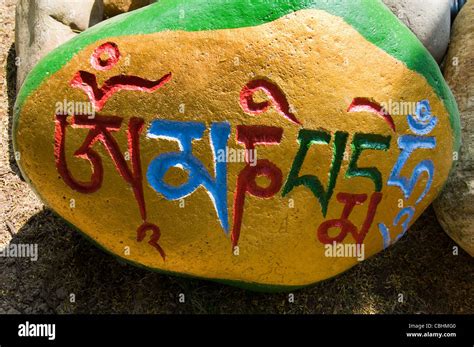 A colorful Mani stone in Tibet Stock Photo - Alamy