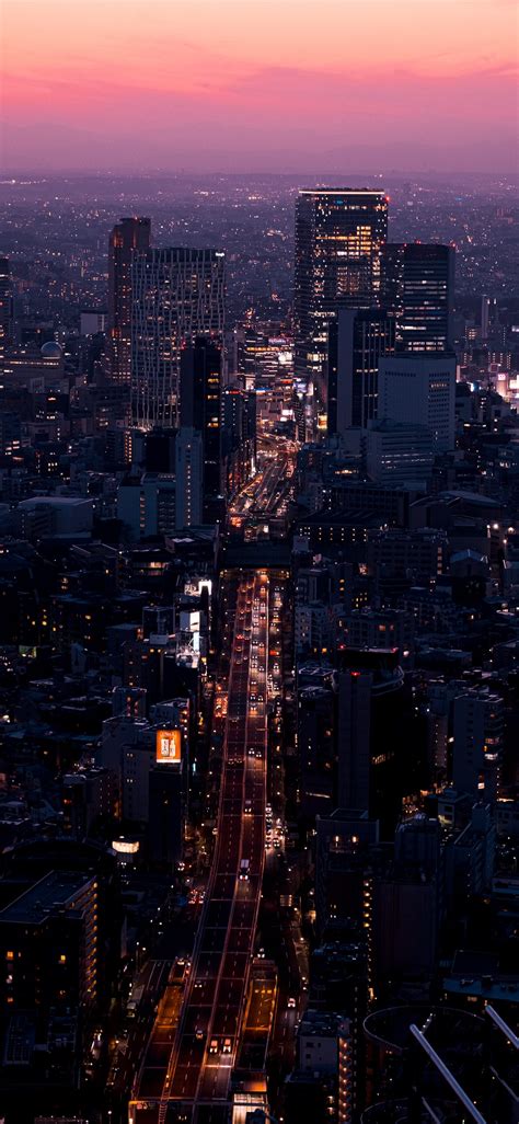 aerial view of city buildings during night time iPhone 11 Wallpapers Free Download
