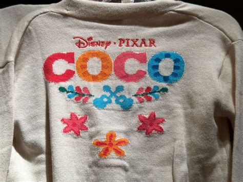 New 'Coco' Loungefly Bags, Youth Apparel, and Apron at Walt Disney ...