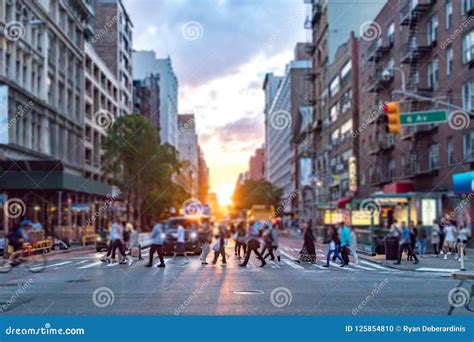 Diverse Crowd of People Walking Across the Busy Intersection in New York City Stock Photo ...