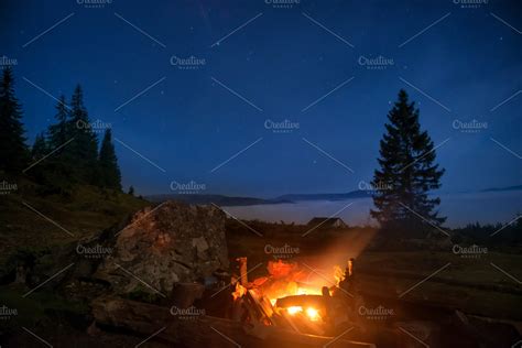 Campfire under blue night sky | High-Quality Nature Stock Photos ...