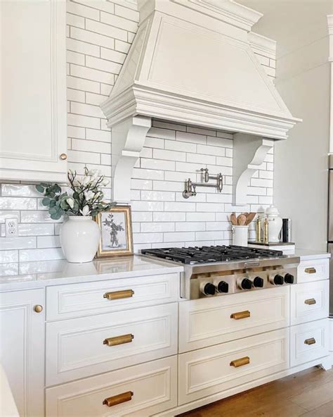 White Kitchen with Brass Cup Drawer Pulls - Soul & Lane