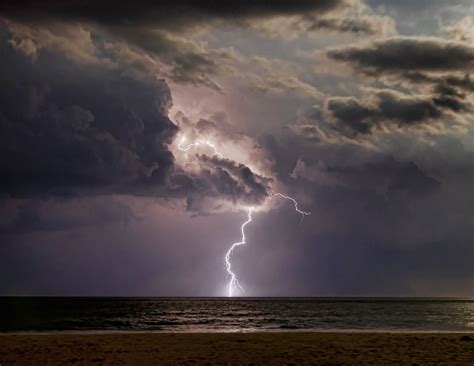 Taken as lightning storm was going out to sea after it passed over Long ...