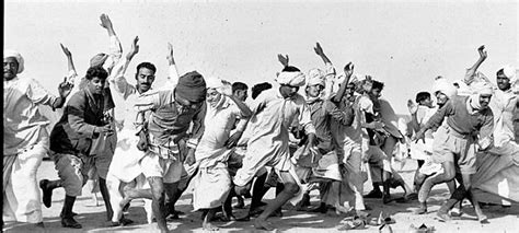 Refugees of the 1947 India-Pakistan Partition participating in a race at a refugee camp ...