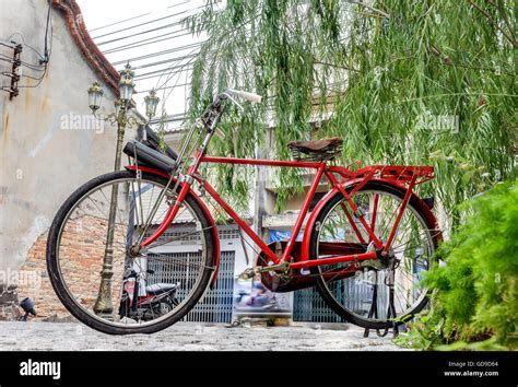 Retro styled image of a vintage red bicycle Stock Photo - Alamy