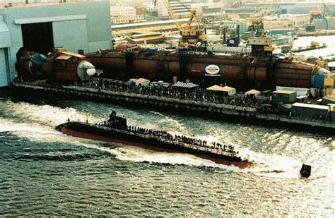 USS Louisville (SSN 724) being launched in December 1985 at Electric Boat Groton, CT. while two ...