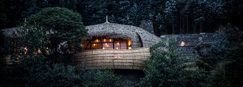 wilderness safaris opens six luxury villas in rwanda with thatched roofs