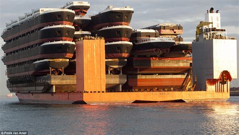 That's a load of ships! The carrier boat that can hold up to 22 barges ...