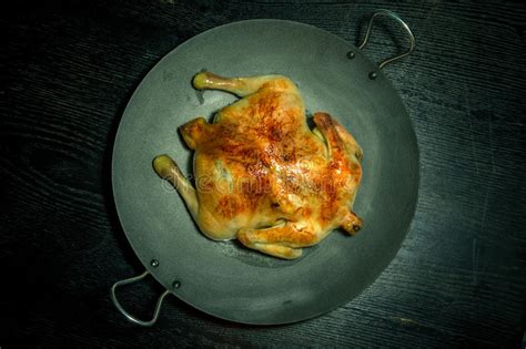Fried Chiken with Vegetables on a Pan on a Black Wooden Table. T Stock Photo - Image of chef ...
