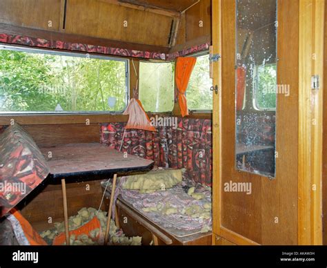 interior view of an old damaged caravan Stock Photo - Alamy