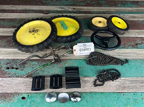 Assorted John Deere Pedal Tractor Parts - Gavel Roads Online Auctions