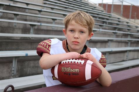 10-year-old Jaxon Payton was born with no hands. That won't stop him from playing youth football