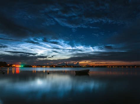 Shining Silver-Blue Clouds Captured in Night Sky Photo | Space