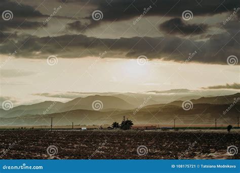 Dramatic Sunset between the Clouds. Stock Image - Image of deserted ...