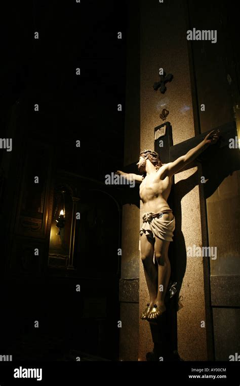 jesus on cross statue in church in rome italy Stock Photo - Alamy