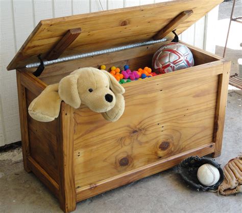 a toy chest with a stuffed dog in it