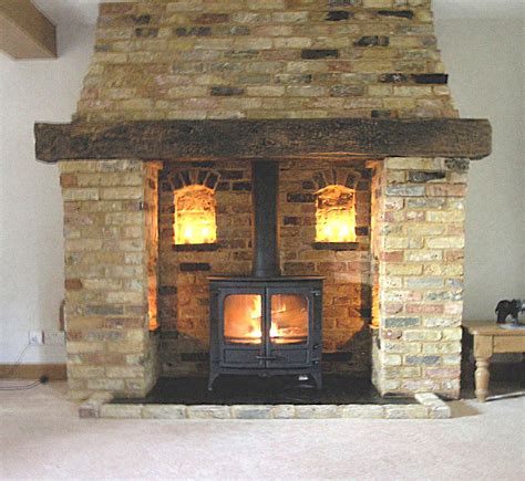 Bespoke reclaimed brick and oak inglenook fireplace with a Charnwood Island 3 multi fuel stove ...