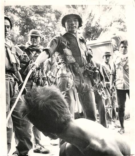 Cambodian soldier takes stick to Vietnamese. Centuries of hatred lead to brutality. July 15 1970 ...