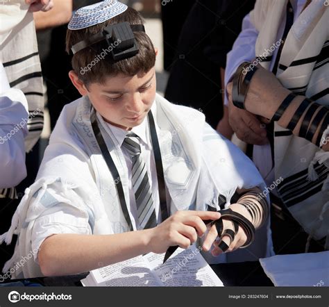 JERUSALEM, ISRAEL - Feb 18, 2013: Bar Mitzvah ritual at the Wailing ...