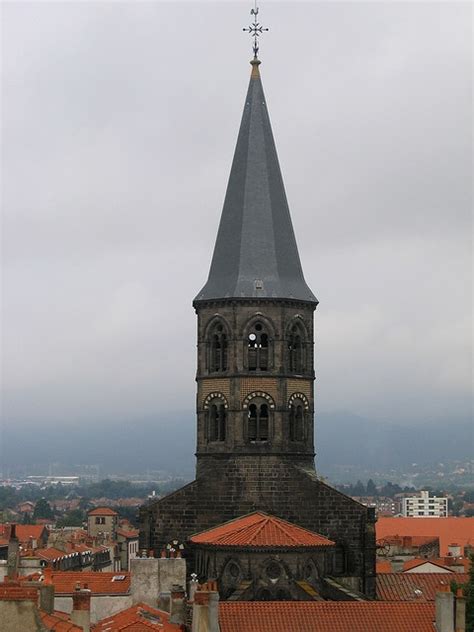 an old building with a steeple on top