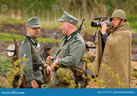 Russian And German Soldiers. The Reconstruction Of The Battle In Military Uniform Of World War ...