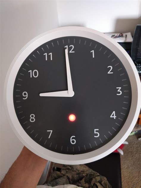 Echo Wall Clock issue.. stays solid red till the batteries are removed ...