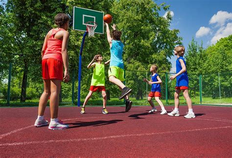 KIDS PLAYING BASKETBALL