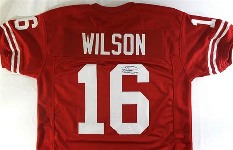 Russell Wilson Signed Wisconsin Jersey (JSA COA) | Pristine Auction