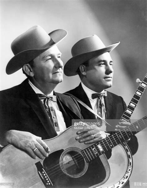 Lester Flatt and Earl Scruggs pose for a portrait circa 1965 in... | Bluegrass music, Country ...