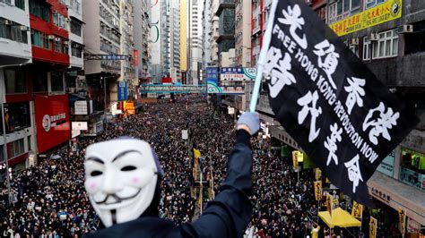 Nearly a million rally in Hong Kong to mark six months of pro-democracy protest movement