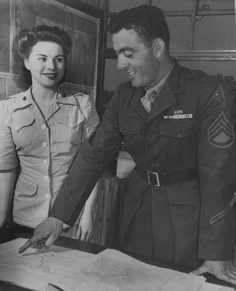 SSgt. John Basilone and Cpl. Margaret Beenworth at the US Marine Corps Headquarters Office in ...